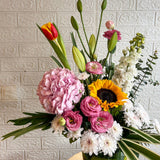 SimplyPhoolish flower arrangement Seven-tastic Florals