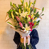 SimplyPhoolish flower arrangement Whispering Lily Bunch